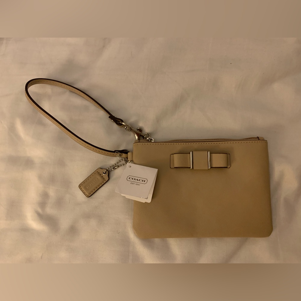 Tan Coach wristlet